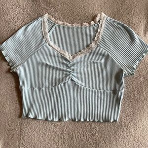 Skein blue with white lace shirt in a size medium